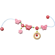 Laden Sie das Bild in den Galerie-Viewer, Haba - Holz Kinderwagenkette Schmetterling mit Glöckchen